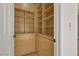 Walk-in closet with wood drawers and shelves at 2873 Knoxville Ct, Henderson, NV 89052