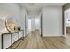 Hallway area with wood floors leading to adjacent rooms at 2873 Knoxville Ct, Henderson, NV 89052