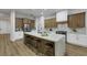 Beautiful kitchen featuring an island with bar stool seating and stainless appliances at 2873 Knoxville Ct, Henderson, NV 89052