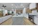 Open kitchen with a spacious island, stainless appliances, and great lighting at 2873 Knoxville Ct, Henderson, NV 89052