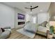 The main bedroom features a ceiling fan, fireplace, television, and sitting area at 2873 Knoxville Ct, Henderson, NV 89052