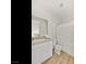 Bathroom featuring granite counters, white cabinets, and a shower/tub at 3 Hilltop Crest St, Henderson, NV 89011