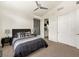Contemporary bedroom with a vaulted ceiling, accent lighting, and ample closet space at 3 Hilltop Crest St, Henderson, NV 89011