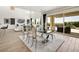 Dining area features an elegant table set and access to the outdoor space at 3 Hilltop Crest St, Henderson, NV 89011