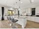 Modern kitchen features a granite countertop island, stainless steel appliances, and plenty of counter space at 3 Hilltop Crest St, Henderson, NV 89011
