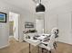 Modern home office with a white desk, comfortable chair, and ample storage space at 3 Hilltop Crest St, Henderson, NV 89011