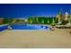 Private pool area with sleek design, lounge chairs, and manicured greenery providing a luxurious outdoor experience at 3 Hilltop Crest St, Henderson, NV 89011