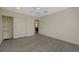 Bright bedroom featuring light grey wood floors, fan, closet, and neutral wall paint at 3034 Scenic Valley Way, Henderson, NV 89052
