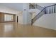 Inviting foyer featuring a staircase and an abundance of natural light from the windows at 3034 Scenic Valley Way, Henderson, NV 89052