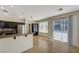 Eat-in kitchen offers bar seating and sliding glass doors to the pool area at 3034 Scenic Valley Way, Henderson, NV 89052