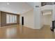 Spacious open-concept living room with tile flooring and large windows providing natural light at 3034 Scenic Valley Way, Henderson, NV 89052