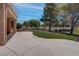 Extended backyard patio with well-maintained landscaping offering a seamless indoor-outdoor living experience at 3040 Hidden Treasure Dr, Las Vegas, NV 89134