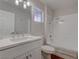 Bathroom featuring a single vanity, long mirror, updated fixtures and a shower-tub combo at 3040 Hidden Treasure Dr, Las Vegas, NV 89134