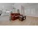 Light-filled living room showcasing hardwood floors, and an open layout, perfect for entertaining at 3040 Hidden Treasure Dr, Las Vegas, NV 89134