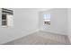 Comfortable bedroom featuring plush carpet, white walls, and large windows at 328 Taylor St, Henderson, NV 89015
