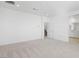 Large, carpeted bonus room with multiple access points at 328 Taylor St, Henderson, NV 89015