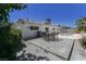 Inviting backyard with a dining set on a large concrete patio, great for entertaining guests outdoors at 3382 Berwyck St, Las Vegas, NV 89121