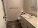 Bathroom features a white sink with marble countertops, toilet, and combination shower-bathtub at 3382 Berwyck St, Las Vegas, NV 89121