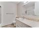 Bathroom features tiled shower, marble counters, and a mirrored wall at 3382 Berwyck St, Las Vegas, NV 89121