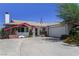 Charming single-story home with a well-maintained front yard and a two-car garage, showcasing curb appeal at 3382 Berwyck St, Las Vegas, NV 89121