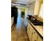 Functional kitchen with ample counter space, tile floors, and modern appliances at 3382 Berwyck St, Las Vegas, NV 89121