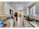 Efficient kitchen design with ample counter space, white cabinetry, and modern appliances at 3382 Berwyck St, Las Vegas, NV 89121