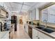 Efficient kitchen design with ample counter space, white cabinetry, and modern appliances at 3382 Berwyck St, Las Vegas, NV 89121