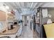 Functional kitchen with granite counters, white cabinetry, and modern appliances, perfect for culinary adventures at 3382 Berwyck St, Las Vegas, NV 89121