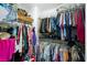Walk-in closet equipped with ample shelving, perfect for storage and organization at 3404 Brayton Mist Dr, North Las Vegas, NV 89081