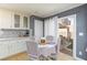 Cozy dining area off the kitchen with sliding glass door to backyard at 3404 Brayton Mist Dr, North Las Vegas, NV 89081