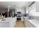 Well-equipped kitchen featuring sleek countertops and stainless steel appliances at 3404 Brayton Mist Dr, North Las Vegas, NV 89081
