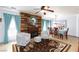 Inviting living room features a cozy fireplace, comfortable seating, and abundant natural light at 3404 Brayton Mist Dr, North Las Vegas, NV 89081
