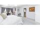 Sun-filled main bedroom with neutral-toned walls and light gray carpeting at 3404 Brayton Mist Dr, North Las Vegas, NV 89081