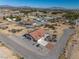 Expansive aerial view of a desert property with lush landscaping and a charming home at 3430 Flagstone Ct, Pahrump, NV 89048