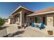 Charming single-story home featuring desert landscaping and a tiled roof and welcoming entrance at 3430 Flagstone Ct, Pahrump, NV 89048