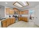 Well-equipped kitchen features updated appliances and a breakfast nook with natural light at 3430 Flagstone Ct, Pahrump, NV 89048