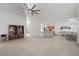 Open concept living room with hardwood floors, a breakfast bar, and easy flow for modern living at 3430 Flagstone Ct, Pahrump, NV 89048