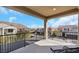 Spacious balcony with views of the neighborhood and surrounding hills at 3512 Portiani Dr, Las Vegas, NV 89141