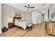 Bright bedroom boasts wood floors and decorative wall sconces at 3512 Portiani Dr, Las Vegas, NV 89141