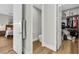 View from the main bedroom into a walk-in closet, with bathroom in between at 3512 Portiani Dr, Las Vegas, NV 89141