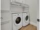 Well-equipped laundry room with modern appliances, ample storage, and a convenient layout at 3512 Portiani Dr, Las Vegas, NV 89141