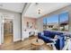 Bright seating area with desk, couch, and view into the ensuite at 3512 Portiani Dr, Las Vegas, NV 89141