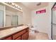 Bathroom featuring a single sink and shower with glass doors at 3942 Delos Dr, Las Vegas, NV 89103