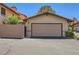 Attached one car garage with a new door and direct access to the house provides convenient parking and storage at 3942 Delos Dr, Las Vegas, NV 89103