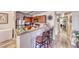 Kitchen with stainless steel appliances and breakfast bar at 4050 Pacific Harbors Dr # 107, Las Vegas, NV 89121