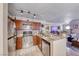 Updated kitchen boasts stainless steel appliances and granite countertops, blending style and functionality at 4050 Pacific Harbors Dr # 107, Las Vegas, NV 89121