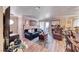 Living room featuring fireplace, couch and patio doors at 4050 Pacific Harbors Dr # 107, Las Vegas, NV 89121