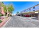 Parking area featuring covered spots at condominium complex at 4050 Pacific Harbors Dr # 107, Las Vegas, NV 89121
