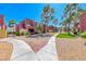 Exterior view of walkways, desert landscaping, and residential buildings at 4050 Pacific Harbors Dr # 245, Las Vegas, NV 89121