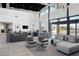 Modern common area with elegant seating arrangements, stylish decor, and abundant natural light at 4180 E Brusca Way, Pahrump, NV 89061